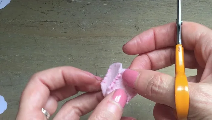 Use an all tool or thin scissors to make a hole for the spout.