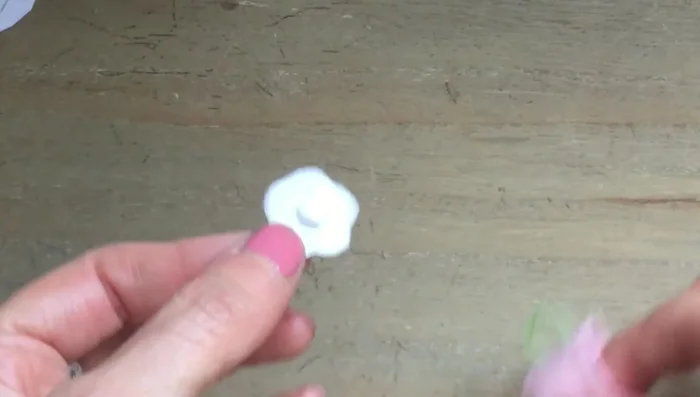 Turn the teapot right side out and glue the base to the felt.