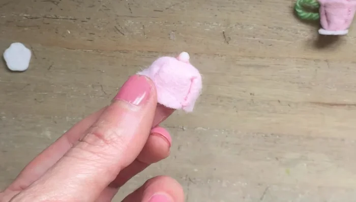 Turn out the lid. Create a tray by cutting out a leaf shape from felt and blanket stitching around the edges.