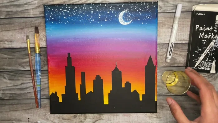 Create splatter stars using thinned white paint and a double brush tapping technique. Alternatively, use fine point paint markers.