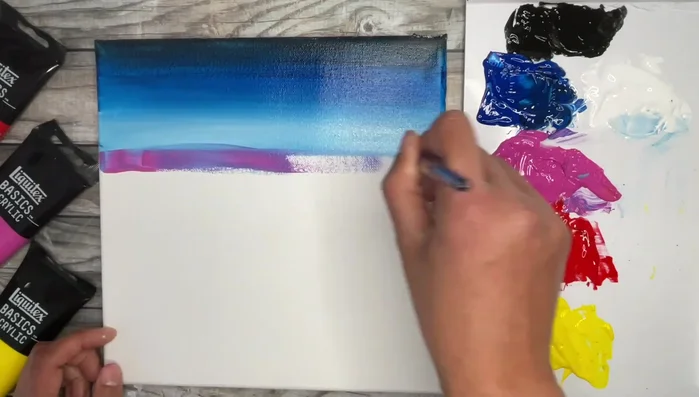 Double load with remaining Phthalo Blue and Medium Magenta to create a purplish tone.