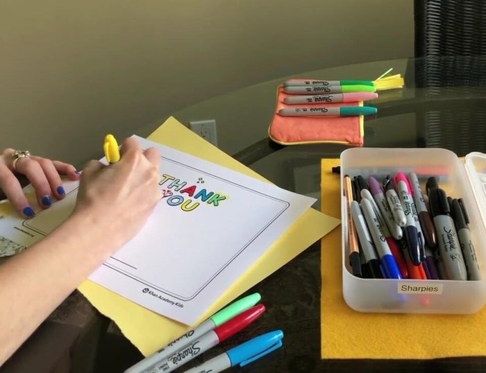 Add smaller half-circles inside the petals in a darker color to create a pattern.