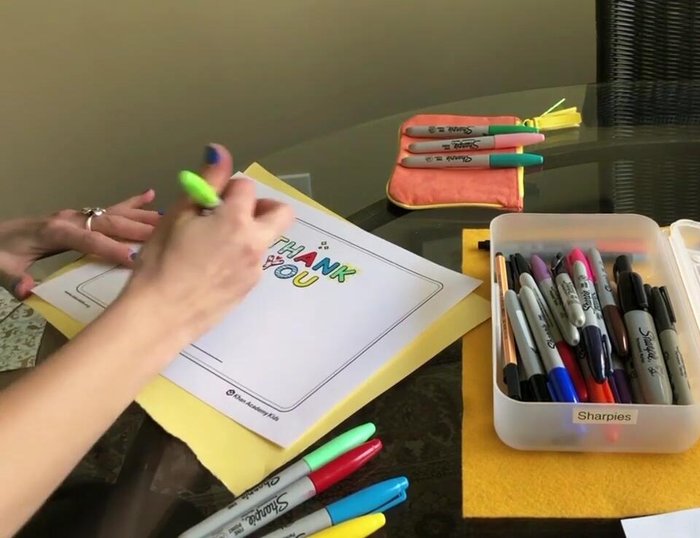 Add smaller half-circles inside the petals in a darker color to create a pattern.