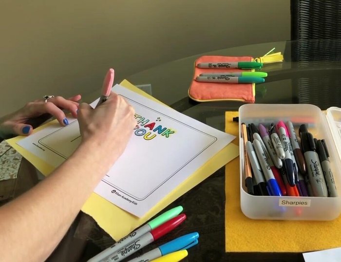 Add smaller half-circles inside the petals in a darker color to create a pattern.