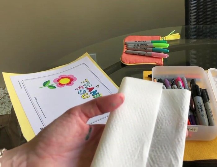 Draw a smaller flower next to the larger one for added detail. (Optional)