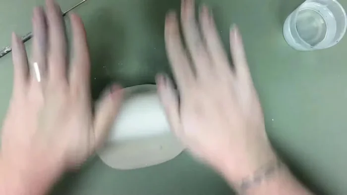 Roll out another small slab for the mug's bottom, using something round as a template if desired.