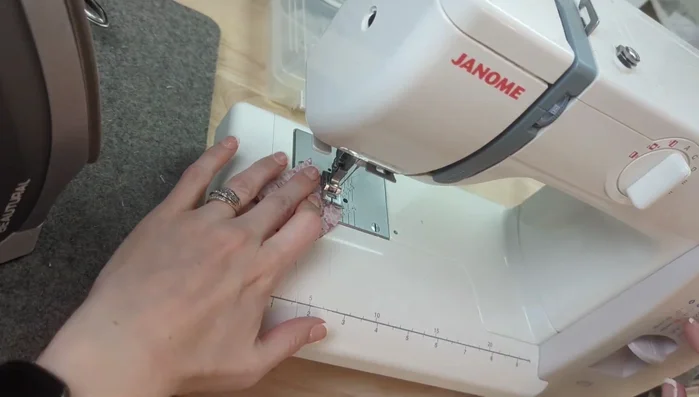 Sew the seams of each hood piece, trim seams, turn one right side out, and fit it inside the other. Sew around the outside of the hood and press flat.