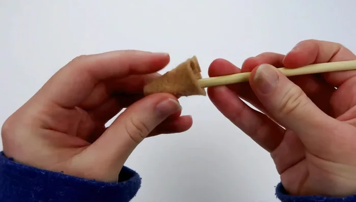 Turn the cone inside out using a dowel or pencil. 