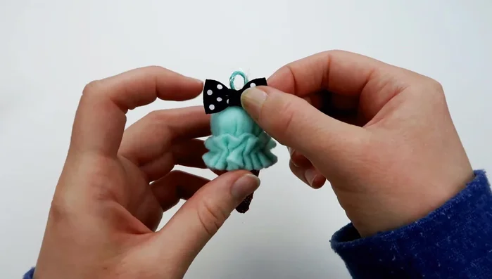 Optional: Glue a bow onto the front of the plushie.