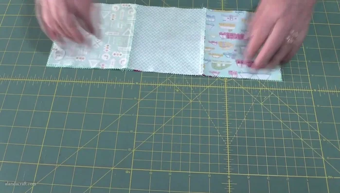 Assemble placemats: Sew the two rows together, nesting seams for a clean finish.