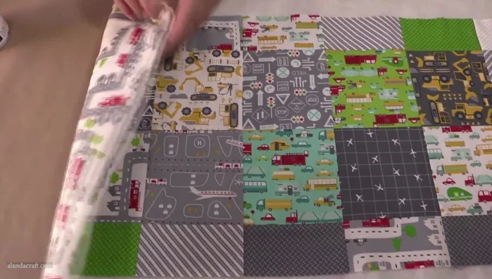 Prepare layers: Spray adhesive on backing fabric, layer batting, and the top (placemats or table runner) face up. Smooth out any wrinkles and press.