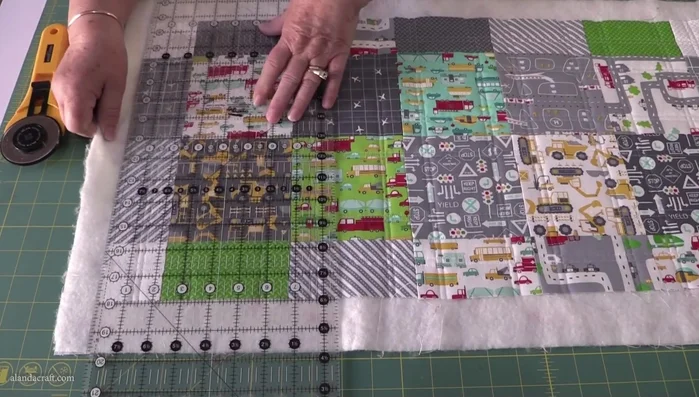 Trim: Trim the edges of the placemats and table runner to a consistent size using a ruler and rotary cutter.