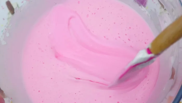 Add cotton candy flavoring (optional).