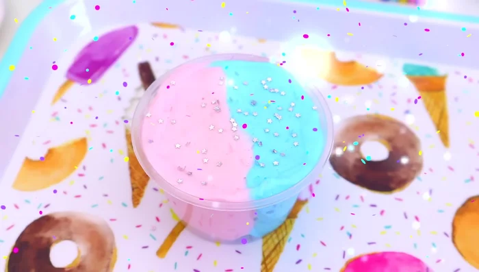 For a cotton candy effect, combine portions of pink and light blue slime in a container. Add glitter (optional).