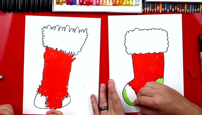 Color your stocking. (Video shows oil pastels being used, but other options are suggested.)