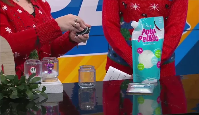 Fill with snow and glitter: Add poly pellets (artificial snow) and glitter to the jar.