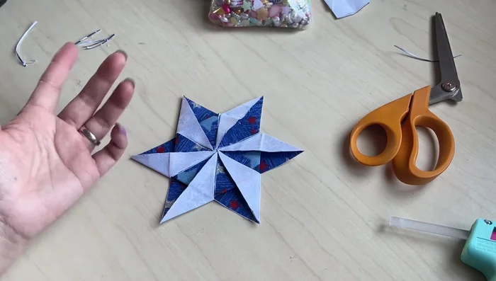 Decorate (Optional): Add beads or other embellishments to the center. If using as a coaster, leave off any embellishments.