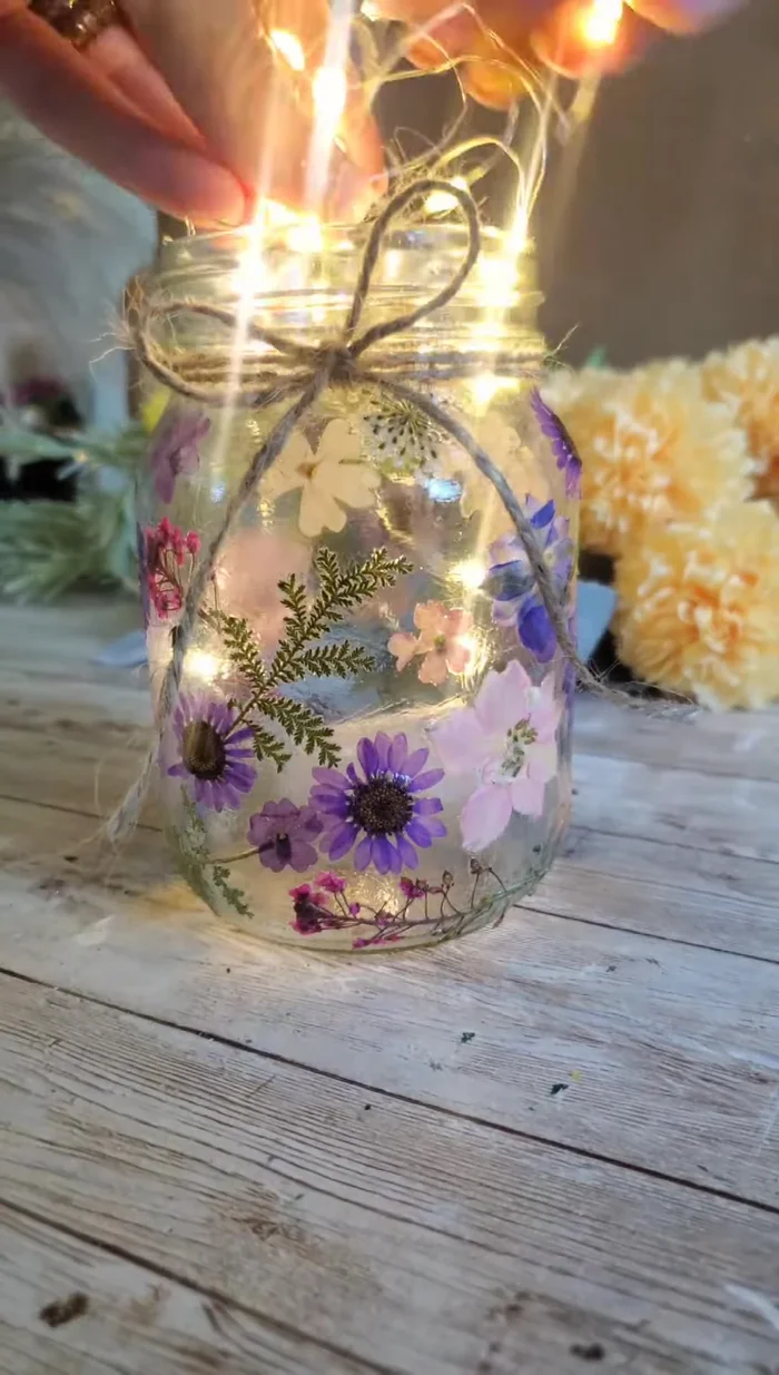 Add fairy lights to the jar, laying the battery pack flat if possible.