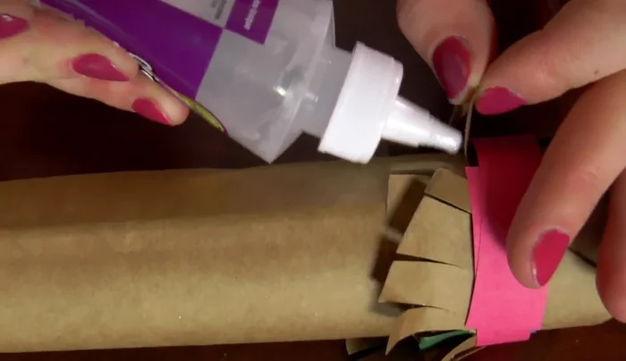 Apply a small amount of glue under the circles to secure the rice.