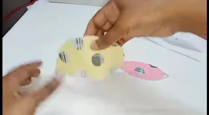 Fold each section in half, creating a smaller, triangular shape.