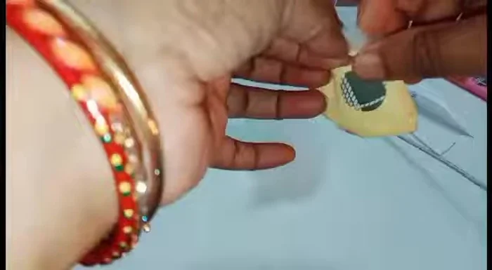 Hand-stitch the opening closed.