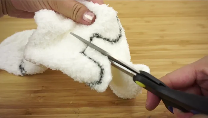 Stuff each leg firmly, then the body, using a generous amount of stuffing.