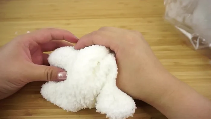 Stuff each leg firmly, then the body, using a generous amount of stuffing.