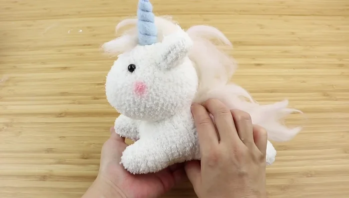 Add blush using felt.