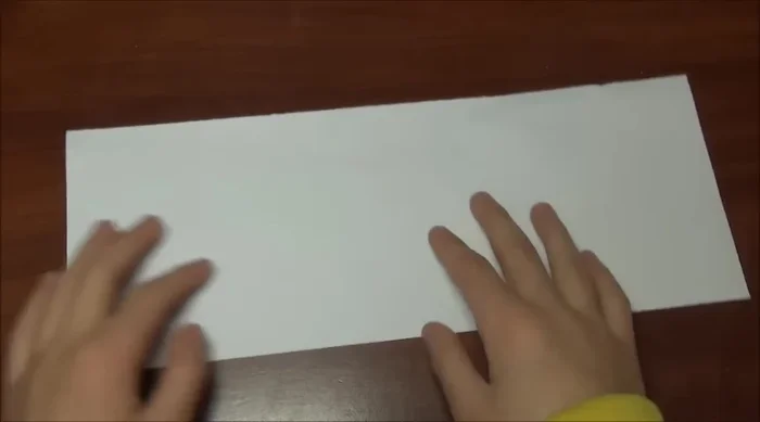 Fold the other half in half, ensuring a clean finish.