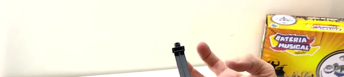 Place the drum onto the assembled legs, ensuring the top part with the hole is facing up.