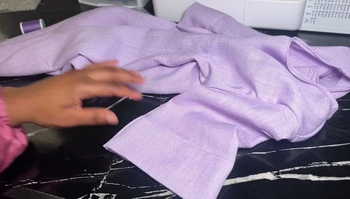 Embellish: Add crescent moon details to the sleeves using embroidery or a knitting kit (optional).