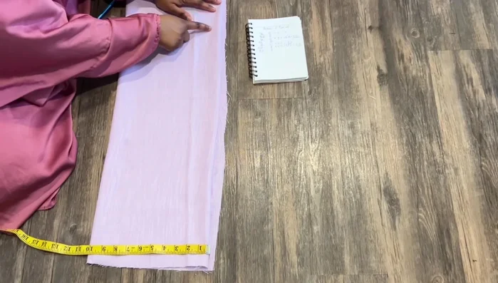 Measure 10 inches across from the bottom and connect the lines. Cut out the Abaya base.