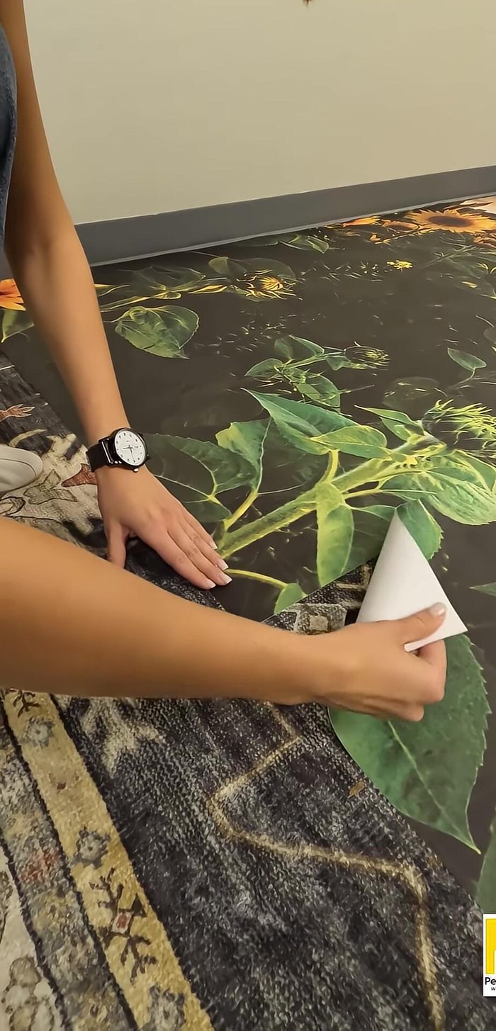 Measure and mark the wall for the first panel (considering the 1-inch bleed). Use a level to mark two points 3 feet apart vertically.