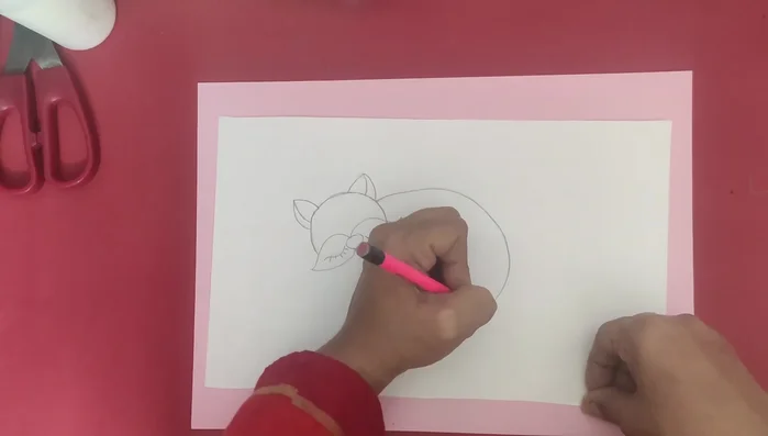 Draw curved lines to create the body and tail.