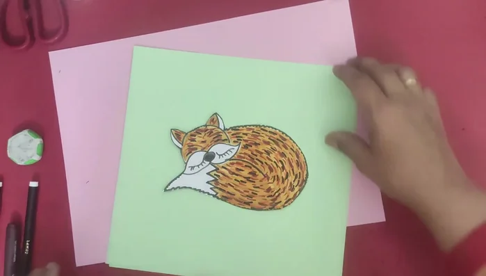 Cut green paper into strips.