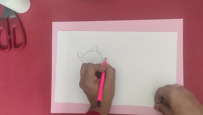 Draw curved lines to create the body and tail.