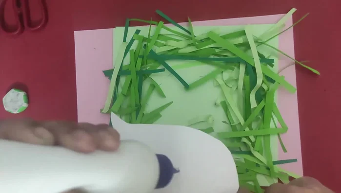 Paste the fox onto the grass base.