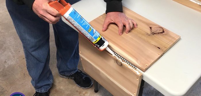 Attach the fifth board, leaving a small gap for air, and cut off any overhang.