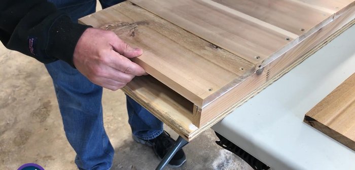 Attach the roof using a good amount of caulk, ensuring angles align for proper downward slope.