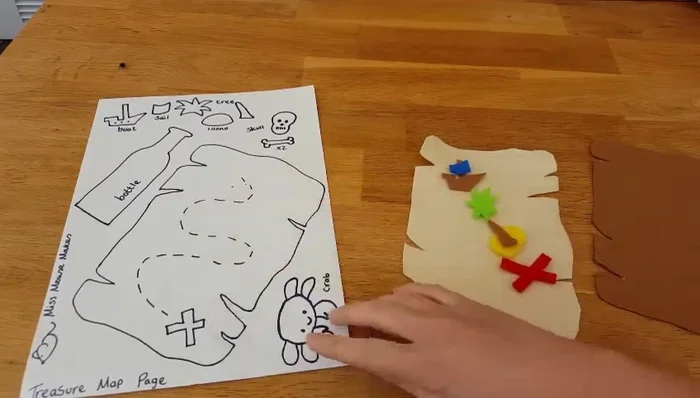 Sew on the 'X' and create the wiggly line using embroidery thread for a thicker, neater look.