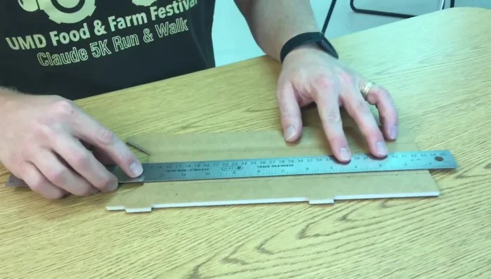 Repeat step 4 for the second parallel line, cutting through about half of the foam.