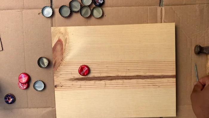 Attach two bottle caps back-to-back using twisty ties to create jingles.