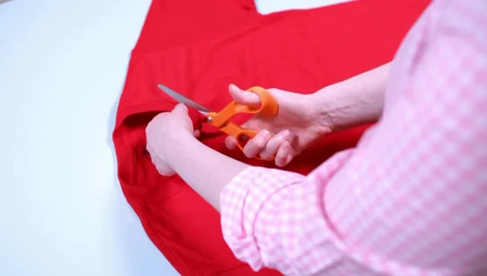 Optional: Pre-glue pom-poms to pieces of self-adhesive felt by dabbing glue onto the felt and pressing it onto the pom-poms.