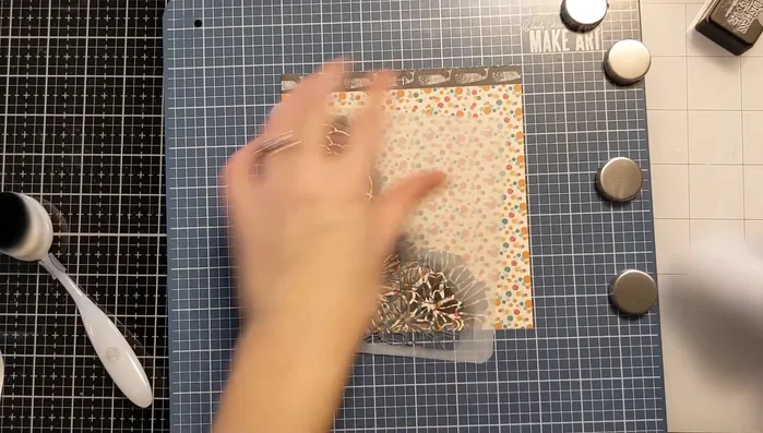 Remove the stencil and Post-it tape to reveal the embossed design.