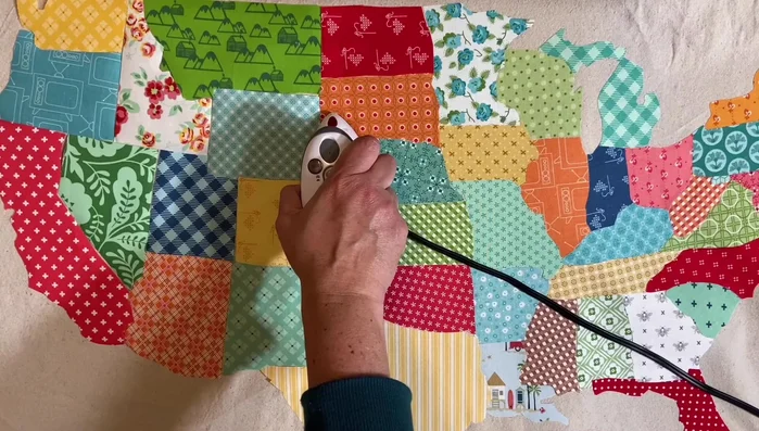 Iron down all the states, wait until the end to cut out Alaska and Hawaii. 