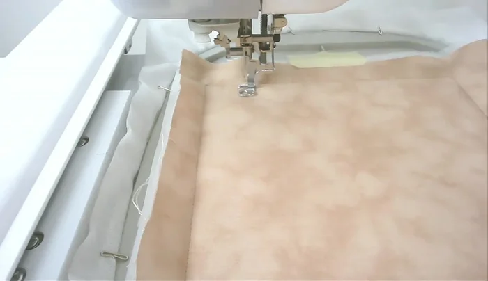 Quilt the frame around the edge (number three).