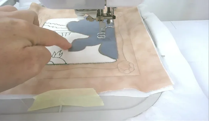 Satin stitch around the feet (number nine).