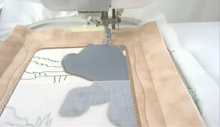 Satin stitch the eyes (numbers thirteen, fourteen, fifteen).