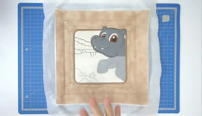 Remove from hoop and trim.