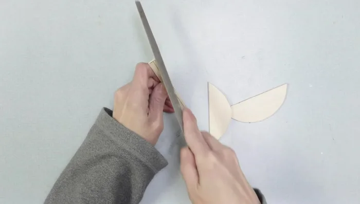 Glue mouth plate pieces to ultra suede using contact cement.